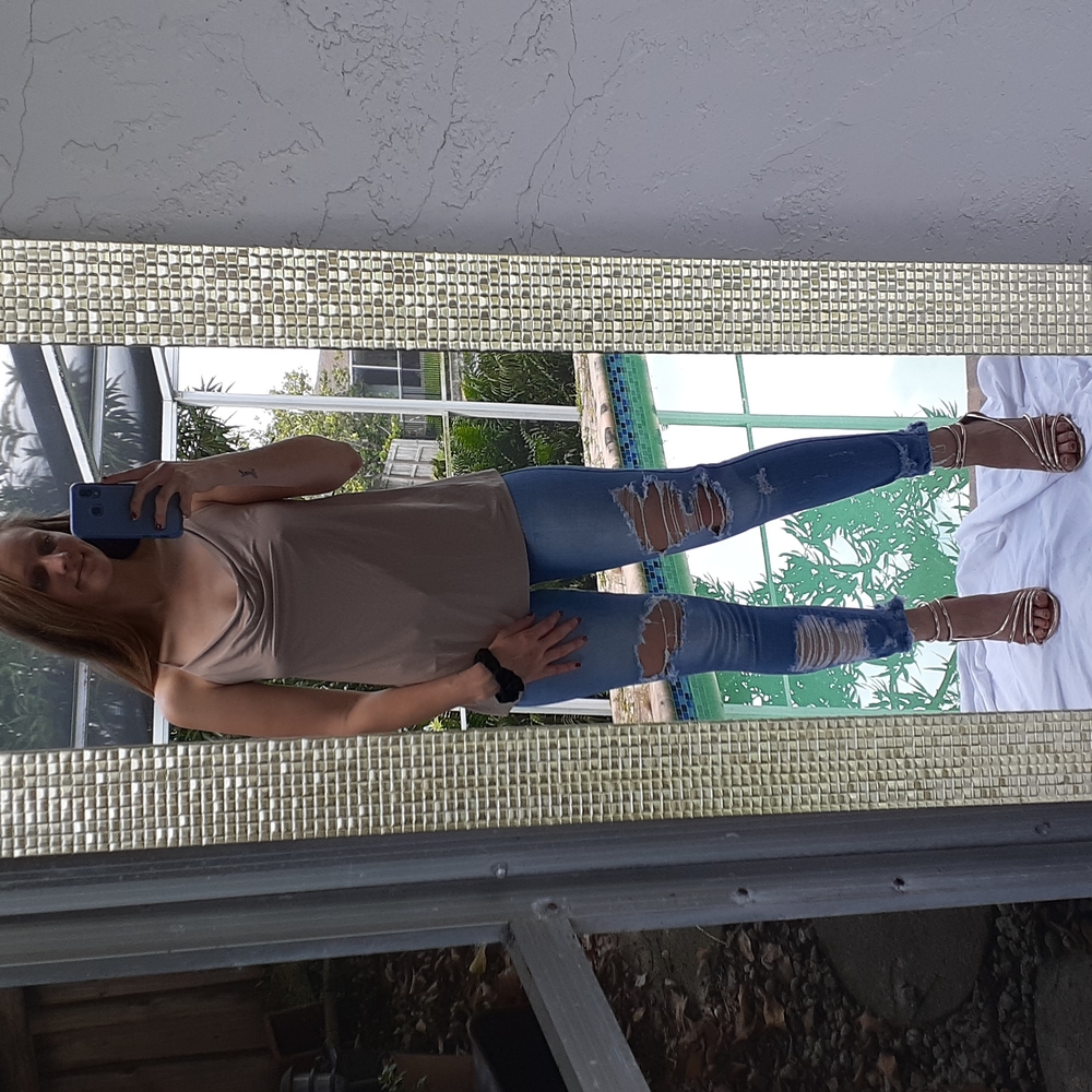 Nude sleeveless cowl neck top
